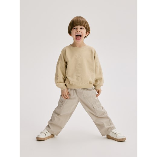 Reserved - Bawełniane spodnie jogger - beżowy Reserved 5-2 lata) Reserved