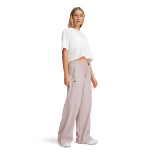 Damskie spodnie treningowe Under Armour Armoursport Wide Leg Pant - różowe ze sklepu Sportstylestory.com w kategorii Spodnie damskie - zdjęcie 178774860
