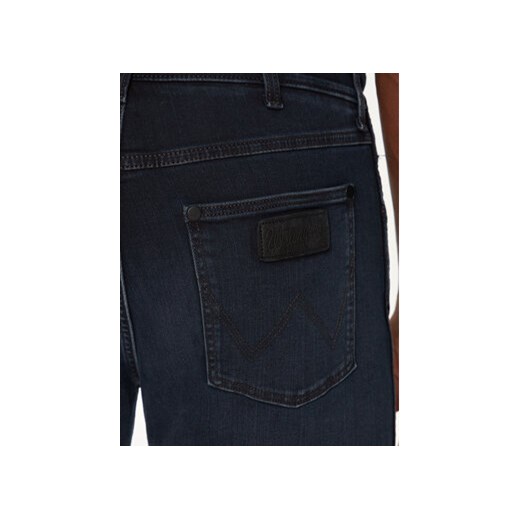 Niebieskie jeansy męskie Wrangler 