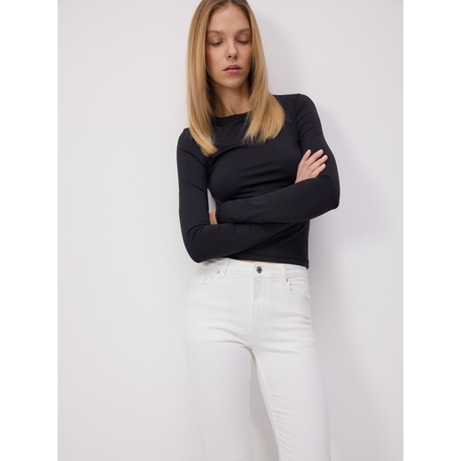 Jeansy damskie białe Reserved
