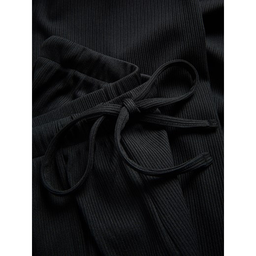 Spodnie damskie Reserved z elastanu 