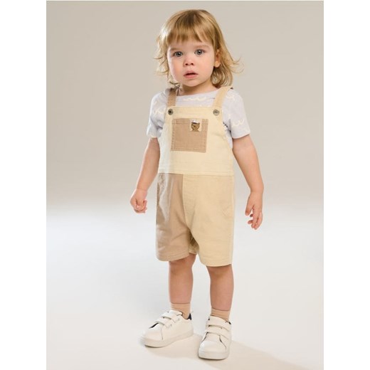 Sinsay - Ogrodniczki jeansowe z ozdobną kieszenią - wielobarwny - id: 917DB-MLC - marki Sinsay - 178899421 Sinsay - Ogrodniczki jeansowe z ozdobną kieszenią - wielobarwny ze sklepu Sinsay w kategorii Spodenki dziewczęce - zdjęcie 178899421