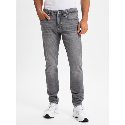 Calvin Klein Jeans Dżinsy slim taper Mężczyźni Bawełna jasny szary jednolity ze sklepu vangraaf w kategorii Jeansy męskie - zdjęcie 178899574