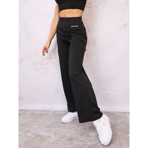 LEGGINSY Z SZEROKIMI NOGAWKAMI I OZDOBNYM NAPISEM- CZARNE ze sklepu olika.com.pl w kategorii Spodnie damskie - zdjęcie 178958894