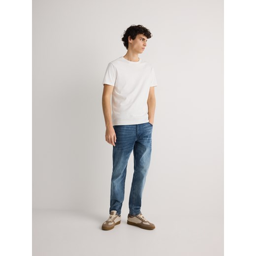 Reserved - Jeansy slim z efektem sprania - niebieski Reserved 33 Reserved