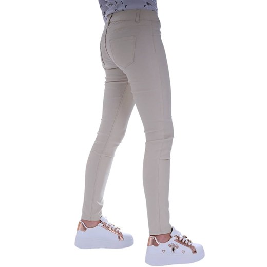Wyszczuplające lśniące legginsy beżowe /H2 UB857 G8-6/ ze sklepu Pantofelek24.pl w kategorii Spodnie damskie - zdjęcie 179057913
