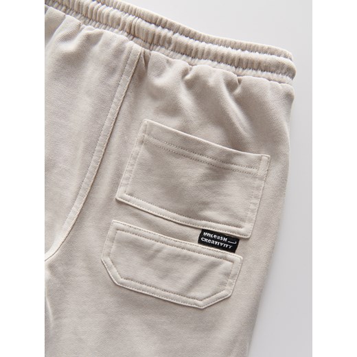 Spodnie chłopięce Reserved beżowe