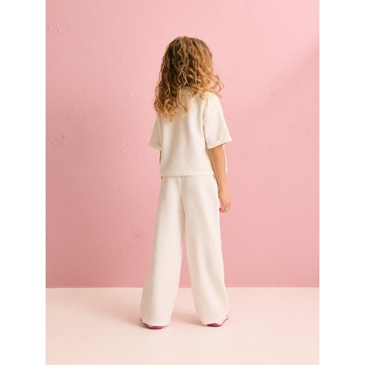 Reserved - Szerokie spodnie dresowe - złamana biel Reserved 146 (10 lat) Reserved