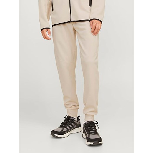 Jack &amp; Jones Spodnie dresowe w kolorze kremowym Jack & Jones L wyprzedaż Limango Polska