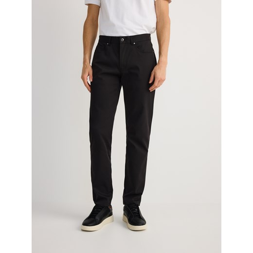 Reserved - Spodnie slim fit z lyocellem - czarny ze sklepu Reserved w kategorii Spodnie męskie - zdjęcie 179078540