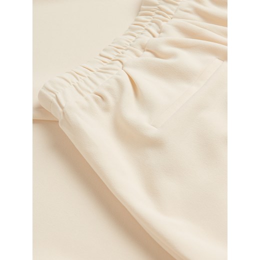 Reserved - Spodnie jogger z zakładkami - jasnożółty Reserved XS Reserved