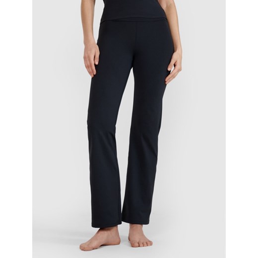 Damskie legginsy do jogi z rozszerzanymi nogawkami 4F 4FWSS25TFTIF324 - czarne ze sklepu Sportstylestory.com w kategorii Spodnie damskie - zdjęcie 179232033
