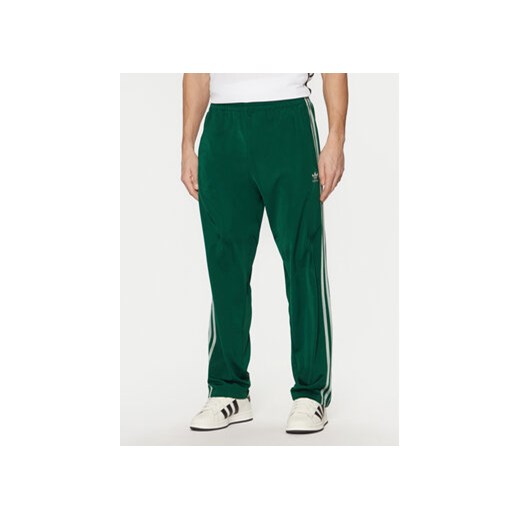 adidas Spodnie dresowe adicolor Classics Firebird JP2539 Zielony Regular Fit ze sklepu MODIVO w kategorii Spodnie męskie - zdjęcie 179235851