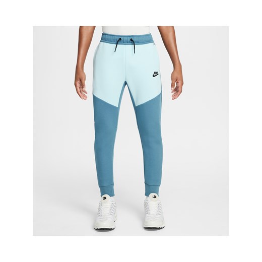 Joggery dla dużych dzieci Nike Sportswear Tech Fleece - Niebieski ze sklepu Nike poland w kategorii Spodnie męskie - zdjęcie 179308403