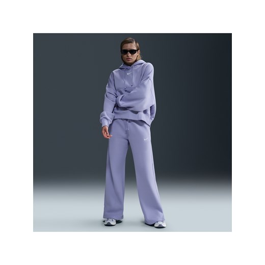 Damskie spodnie dresowe z wysokim stanem i szerokimi nogawkami Nike Sportswear Phoenix Fleece - Fiolet ze sklepu Nike poland w kategorii Spodnie damskie - zdjęcie 179308471