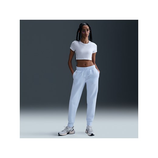 Damskie spodnie dresowe ze średnim stanem Nike Sportswear Phoenix Fleece - Niebieski ze sklepu Nike poland w kategorii Spodnie damskie - zdjęcie 179308903