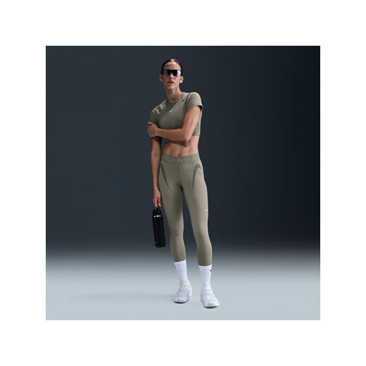 Damskie legginsy o długości 7/8 ze średnim stanem i grafiką Nike Pro - Zieleń ze sklepu Nike poland w kategorii Spodnie damskie - zdjęcie 179309061