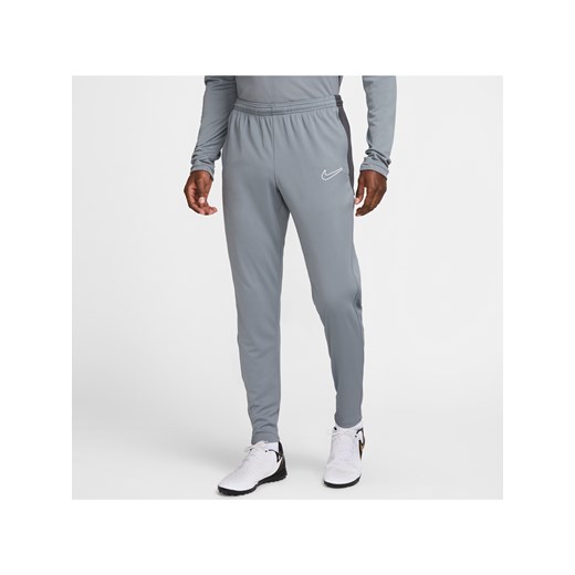 Męskie spodnie piłkarskie Dri-FIT Nike Academy - Szary ze sklepu Nike poland w kategorii Spodnie męskie - zdjęcie 179309133