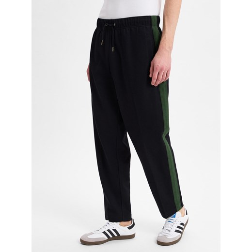 Fred Perry Męskie spodnie do biegania - Toweling Tape Track Pant Mężczyźni czarny wypukły wzór tkaniny ze sklepu vangraaf w kategorii Spodnie męskie - zdjęcie 179335283