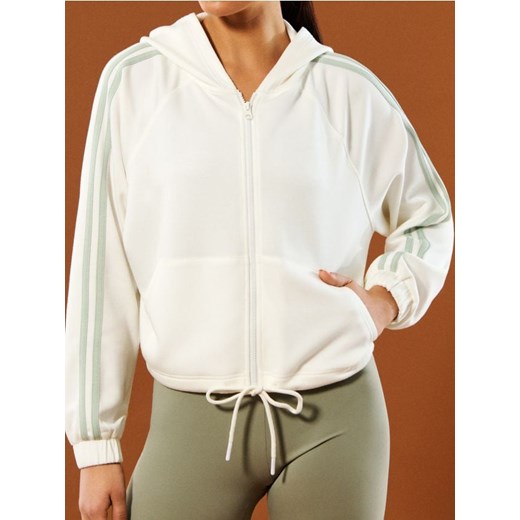Sinsay - Rozpinana bluza z kapturem Gym Hard - kremowy ze sklepu Sinsay w kategorii Bluzy damskie - zdjęcie 179358164