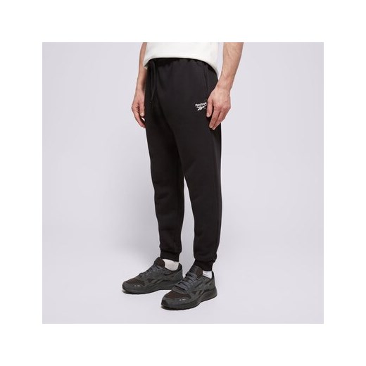 REEBOK SPODNIE RI FT LEFT LEG JOGGER ze sklepu Sizeer w kategorii Spodnie męskie - zdjęcie 179384320