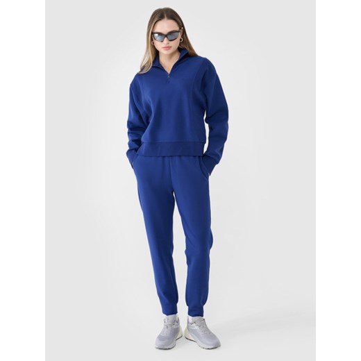 Damskie spodnie dresowe joggery 4F 4FWSS25TTROF0996 - granatowe ze sklepu Sportstylestory.com w kategorii Spodnie damskie - zdjęcie 179397073