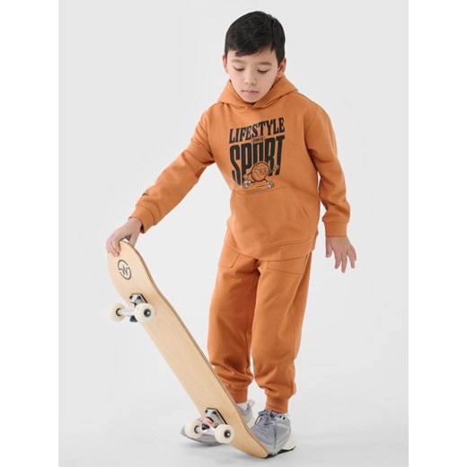 Chłopięca bluza dresowa nierozpinana z kapturem 4F 4FJRSS25TSWSM2041 -  niebieska ze sklepu Sportstylestory.com w kategorii Bluzy chłopięce - zdjęcie 179404064