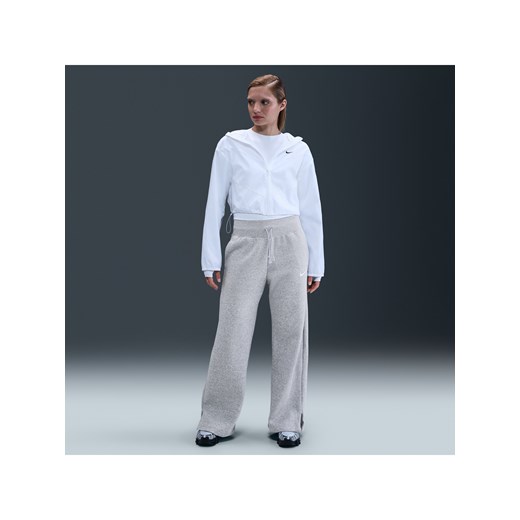 Damskie spodnie dresowe z wysokim stanem i szerokimi nogawkami Nike Phoenix Nike L (EU 44-46) promocja Nike poland