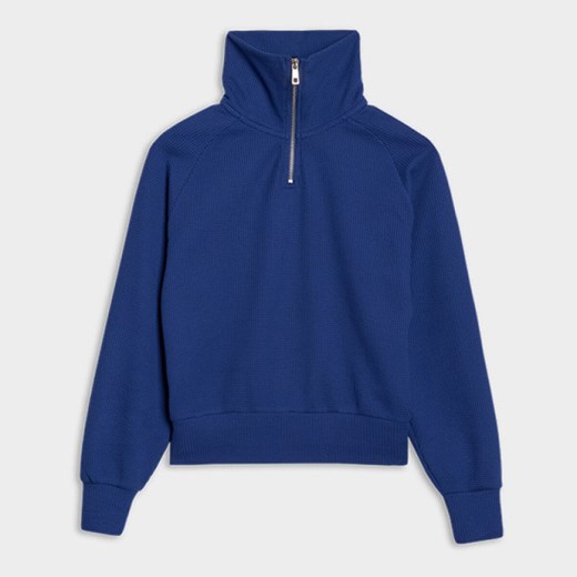 Damska bluza dresowa bez kaptura 4F 4FRSS25TSWSF2151 - niebieska ze sklepu Sportstylestory.com w kategorii Bluzy damskie - zdjęcie 179536210