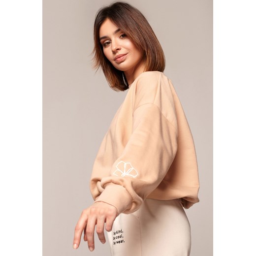 Bluza z dekoltem na plecach - beżowa ze sklepu Cudmoda w kategorii Bluzy damskie - zdjęcie 179656623