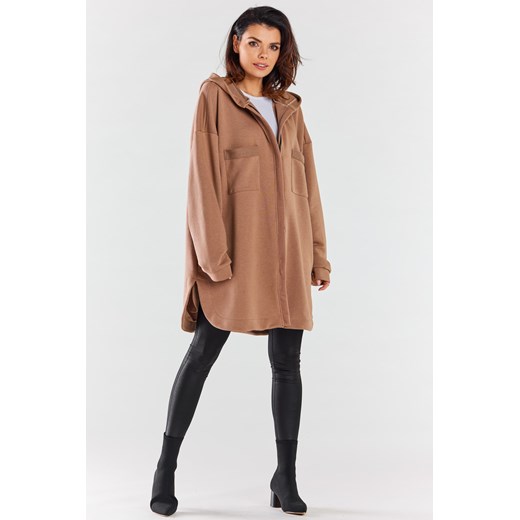 Luźna bluza z kapturem i kieszeniami - beżowa ze sklepu Cudmoda w kategorii Bluzy damskie - zdjęcie 179657921