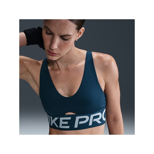 Damski stanik sportowy z wkładkami i średnim wsparciem Nike Pro Indy Plunge - Niebieski ze sklepu Nike poland w kategorii Biustonosze - zdjęcie 179670862
