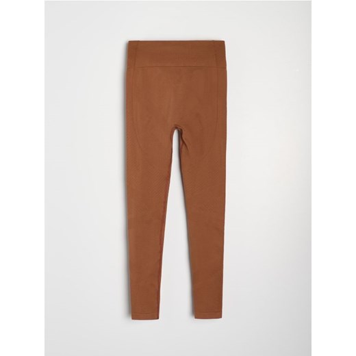 Sinsay - Legginsy sportowe z ozdobnymi przeszyciami - brązowy Sinsay M/L Sinsay