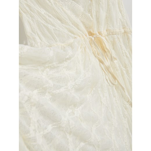 Sukienka beżowa Reserved z elastanu 