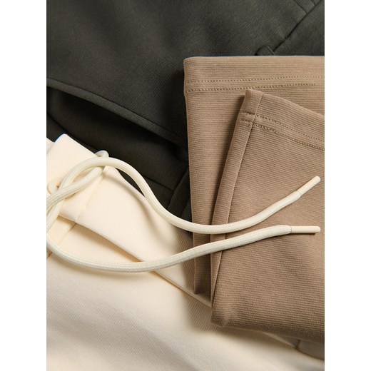 Reserved - Spodnie chino slim fit - złamana biel Reserved XXL Reserved