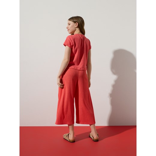 Reserved - Bluzka z asymetrycznym przeszyciem - koralowy Reserved 122 (6-7 lat) Reserved