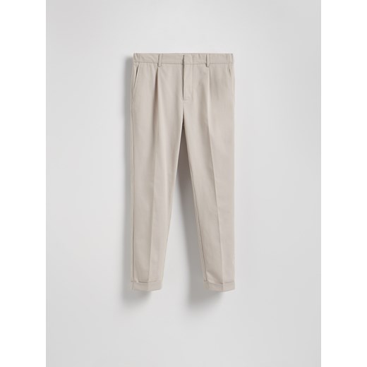 Reserved - Spodnie z dodatkiem wełny - beżowy ze sklepu Reserved w kategorii Spodnie męskie - zdjęcie 179736914