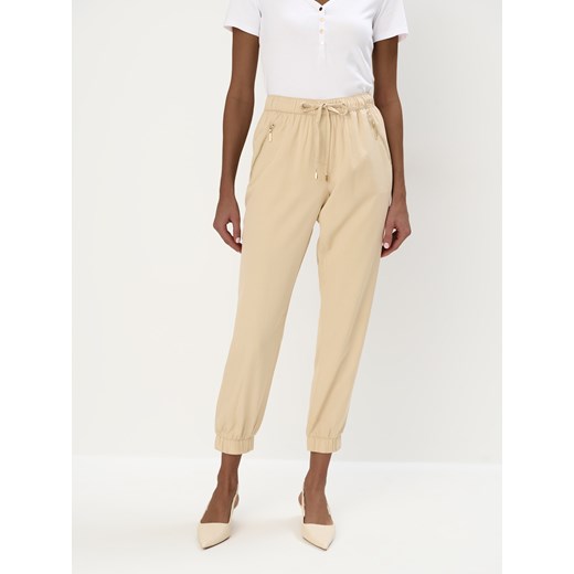 Mohito - Beżowe spodnie joggery - beżowy Mohito 36 Mohito