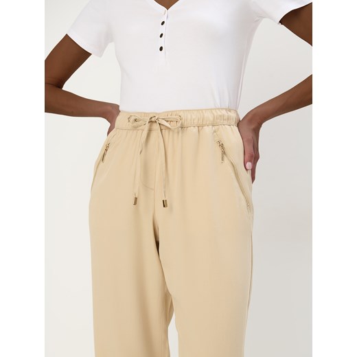 Mohito - Beżowe spodnie joggery - beżowy Mohito 36 Mohito