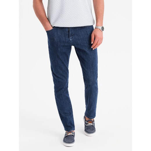 Klasyczne spodnie męskie jeansy SLIM FIT z elastanem – ciemnoniebieskie V3 OM-PADP-0216 ze sklepu ombre w kategorii Jeansy męskie - zdjęcie 180284761