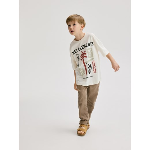 T-shirt chłopięce Reserved biały z nadrukami bawełniany 