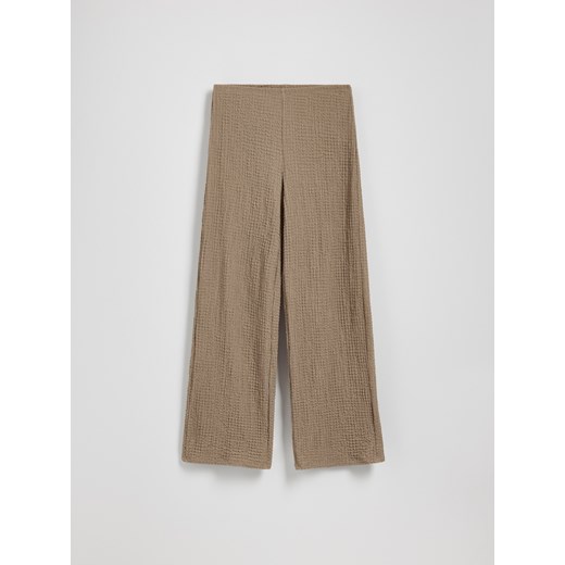 Reserved - Spodnie z kreszowanej dzianiny - beżowy Reserved S Reserved