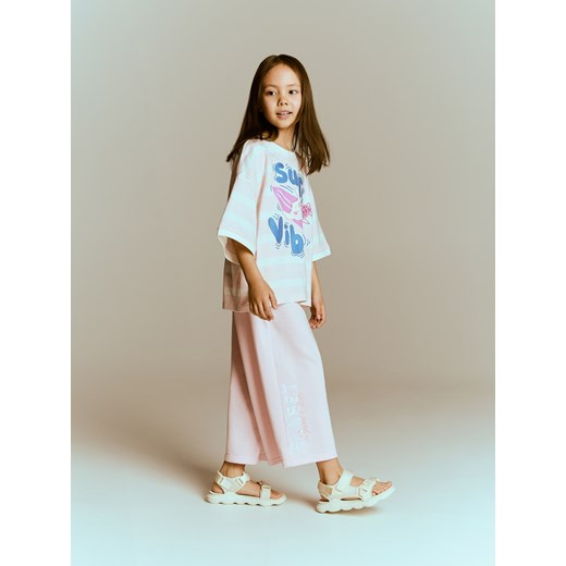 Reserved - Szerokie spodnie dresowe - pastelowy róż Reserved 122 (6-7 lat) Reserved