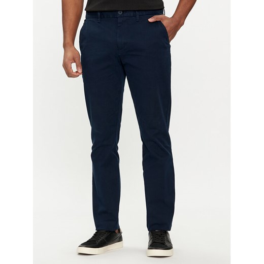 Tommy Jeans Chinosy Austin DM0DM19166 Granatowy Slim Fit ze sklepu MODIVO w kategorii Spodnie męskie - zdjęcie 181037253