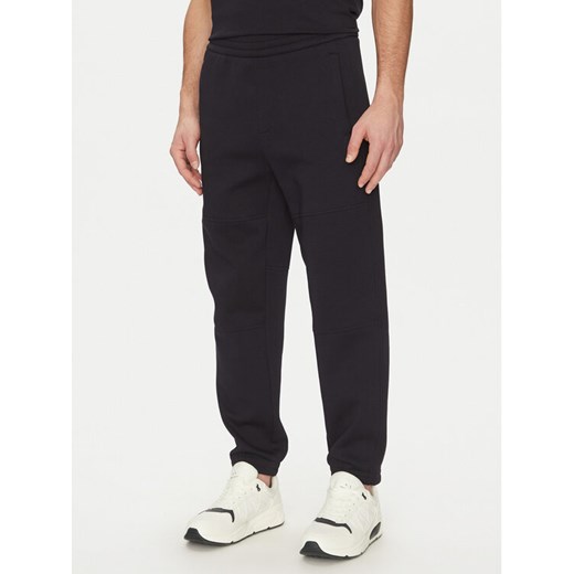 Armani Exchange Spodnie dresowe XM000354 AF10818 UB101 Granatowy Regular Fit ze sklepu MODIVO w kategorii Spodnie męskie - zdjęcie 181180994