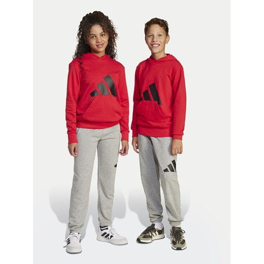 adidas Spodnie dresowe Essentials JD2092 Szary Regular Fit ze sklepu MODIVO w kategorii Spodnie chłopięce - zdjęcie 181196881