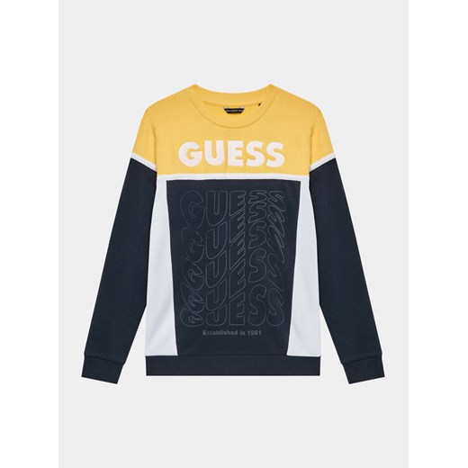 Guess Bluza N3BQ02 KAX73 Granatowy Regular Fit ze sklepu MODIVO w kategorii Bluzy chłopięce - zdjęcie 181208080