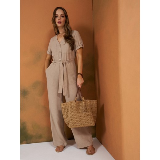 Beżowy kombinezon damski Sinsay na wiosnę 
