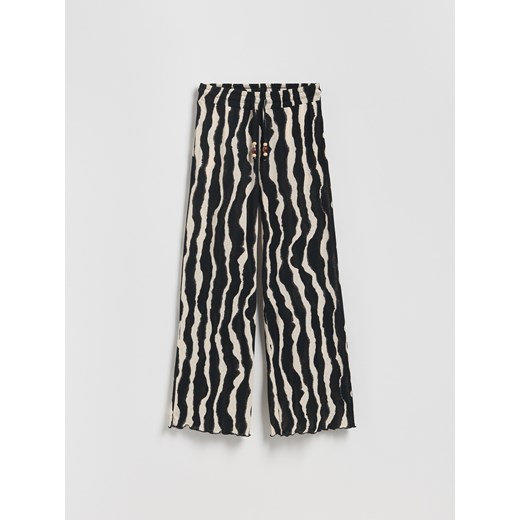 Reserved - Wzorzyste spodnie z koralikami - wielobarwny Reserved S Reserved