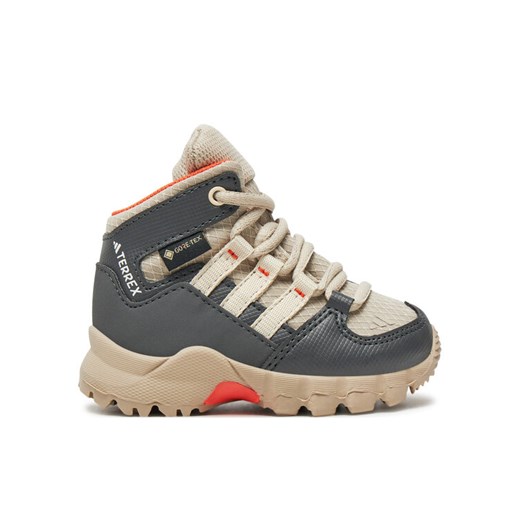 Trekkingi adidas Terrex Mid GORE-TEX ID0934 Beżowy ze sklepu eobuwie.pl w kategorii Buty trekkingowe dziecięce - zdjęcie 182050270